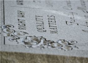 Lenny Anderson working on custom monument engraving in the shop