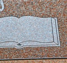 Sandblasted deer and woodland scene on granite headstone