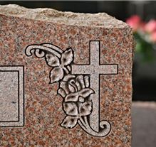 Sandblasted eagle design on polished granite memorial