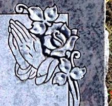 Elegant italic lettering on polished granite headstone