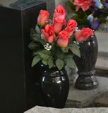 Gray granite memorial with sandblast scenic carving