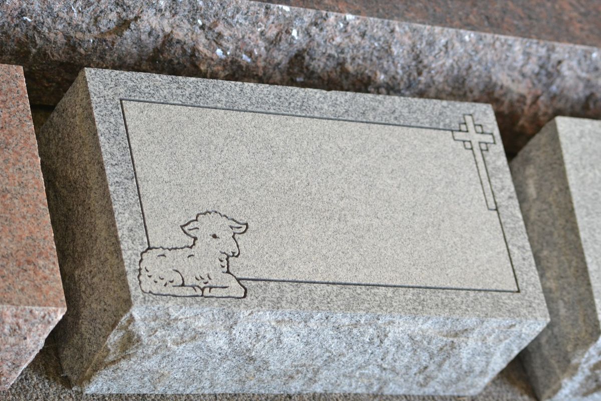 Granite bevel marker with polished finish and deep lettering